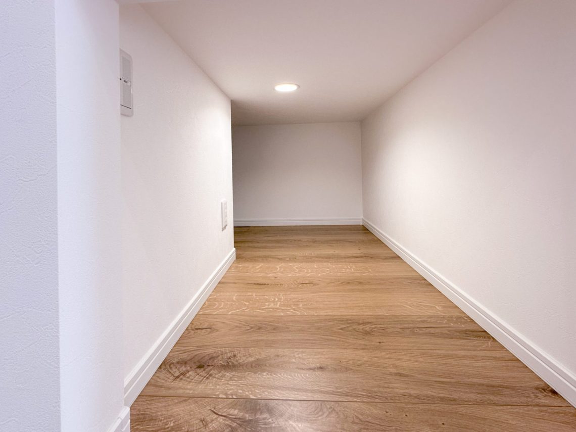 わさびグリーンの外壁がかわいいスキップフロアがあるお家