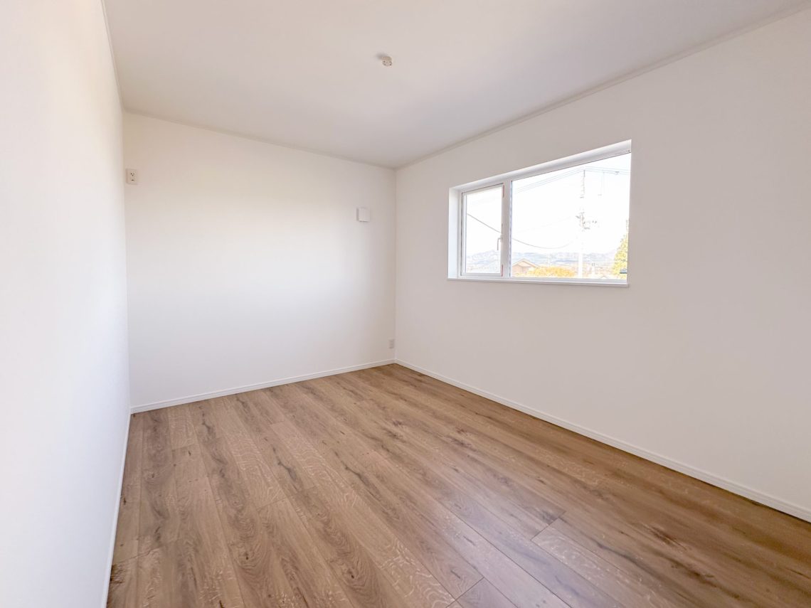 わさびグリーンの外壁がかわいいスキップフロアがあるお家