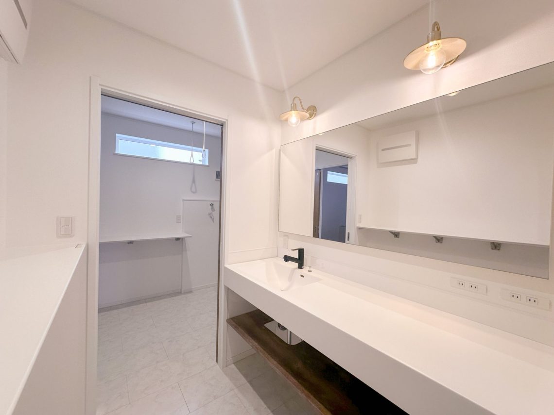 わさびグリーンの外壁がかわいいスキップフロアがあるお家